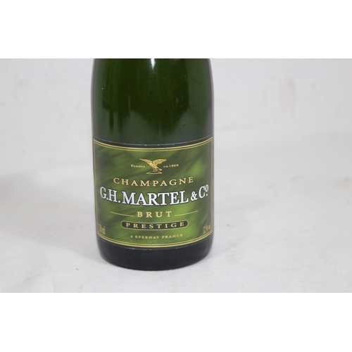 721 - BOTTLE OF G H MARTEL AND CO CHAMPAGNE