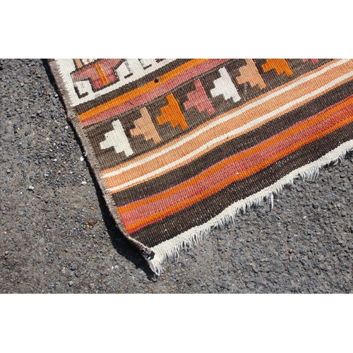 287 - HANDMADE EASTERN RUG
207 X 104CM