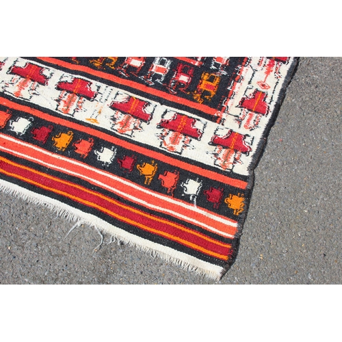 287 - HANDMADE EASTERN RUG
207 X 104CM