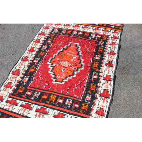 287 - HANDMADE EASTERN RUG
207 X 104CM