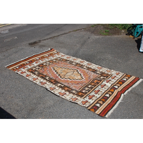 287 - HANDMADE EASTERN RUG
207 X 104CM