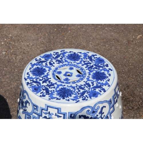 358 - PAIR OF LARGE BLUE AND WHITE ORIENTAL BARREL SEATS 
45CM