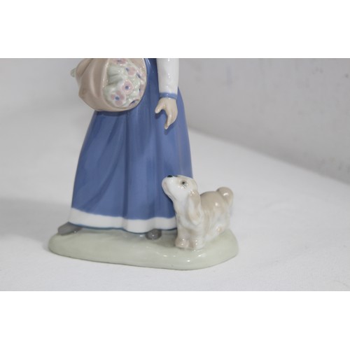 876 - LLADRO FIGURINE OF A YOUNG GIRL WITH CANDLE AND ONE OTHER 
21CM