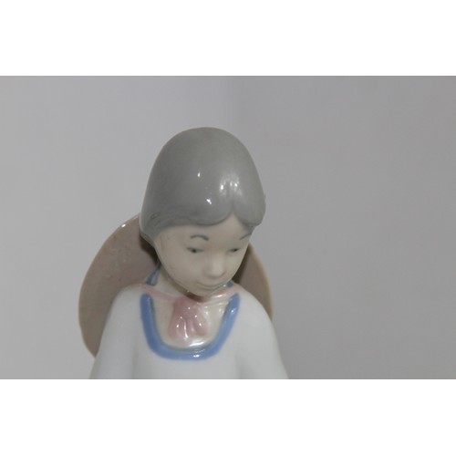 876 - LLADRO FIGURINE OF A YOUNG GIRL WITH CANDLE AND ONE OTHER 
21CM