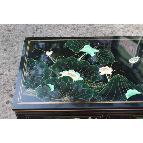 10 - LAQUERED CHINESE COFFEE TABLE 
127 X 51 X 41CM