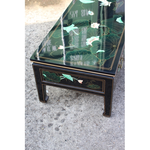 10 - LAQUERED CHINESE COFFEE TABLE 
127 X 51 X 41CM