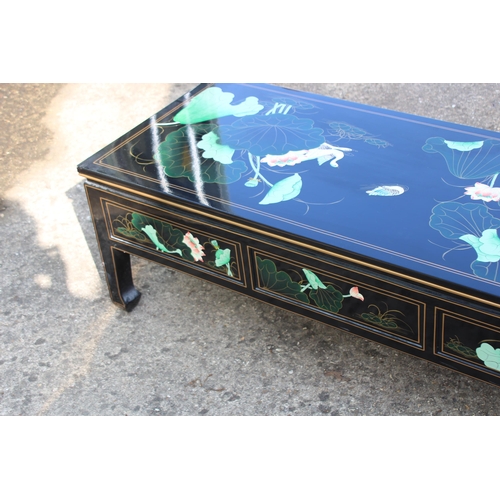 10 - LAQUERED CHINESE COFFEE TABLE 
127 X 51 X 41CM