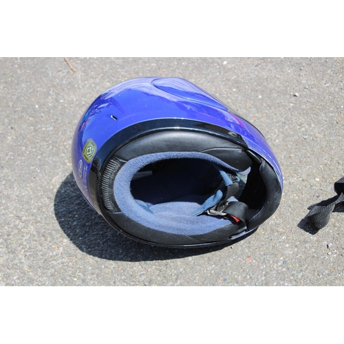 589 - THREE MOTORBIKE HELMETS