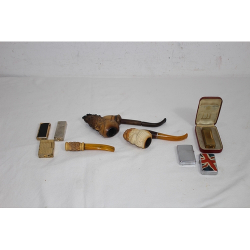 941 - QUANTITY OF VINTAGE CARVED MEERSHAM STYLE PIPES AMD QUANTITY OF LIGHTERS