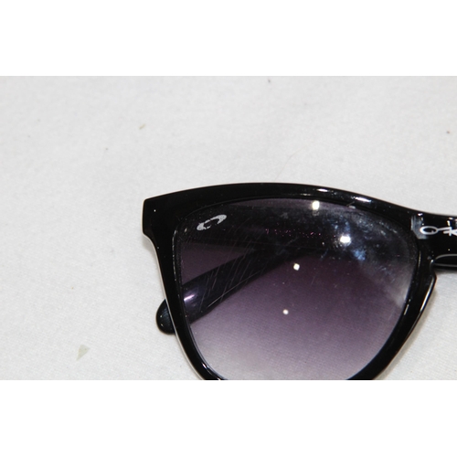 948 - PAIR OF VINTAGE OAKLEY SUNGLASSES