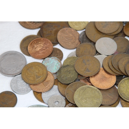 1001 - LARGE TIN OF VARIOUS COINS AND BANKNOTES