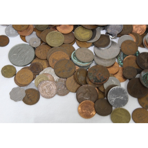 1001 - LARGE TIN OF VARIOUS COINS AND BANKNOTES