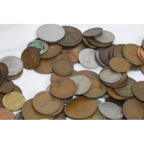 1001 - LARGE TIN OF VARIOUS COINS AND BANKNOTES