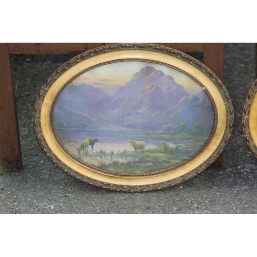 242 - TWO OVAL PAINTINGS OF HIGHLAND SCENES
45 X 35CM