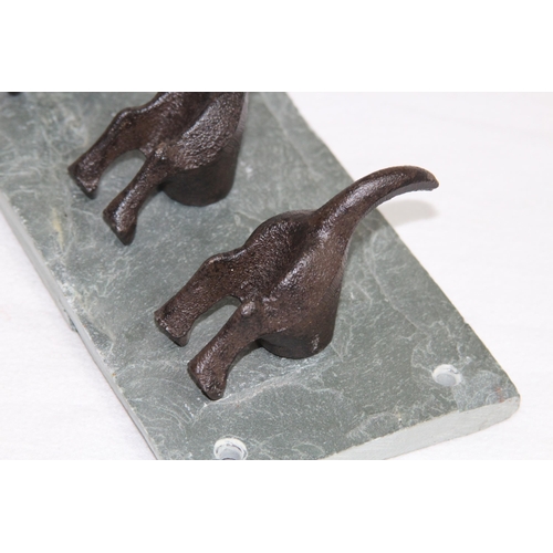 593 - NOVELTY DOGS BOTTOMS AND TAILS FORM CLOTHES HANGER ON A SLATE BACK
30 X 10CM