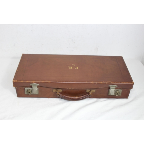 606 - LEATHER SUITCASE WITH MASONIC REGALIA