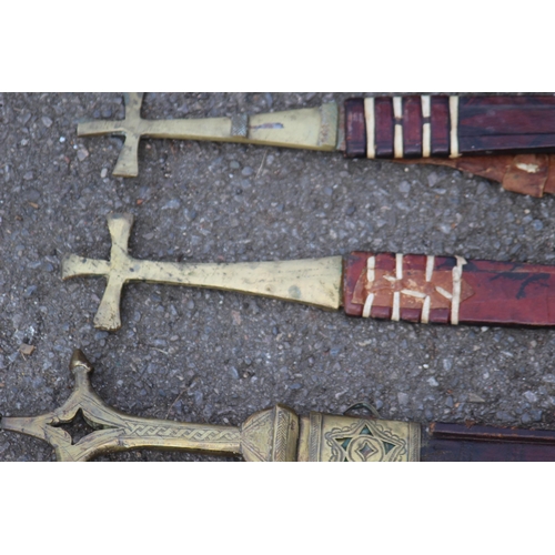 608 - FIVE ANTIQUE AND VINTAGE SWORDS, BELIEVED TO BE OF AFRICAN DESENT