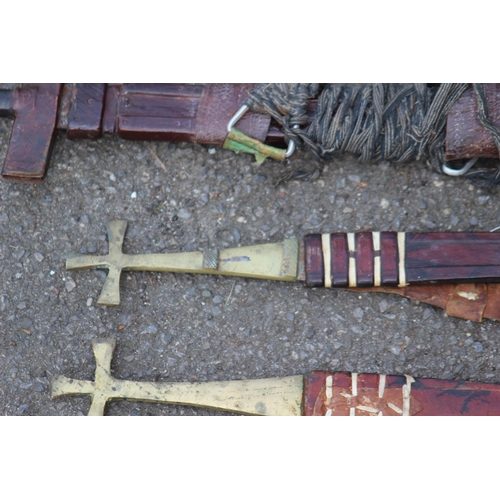 608 - FIVE ANTIQUE AND VINTAGE SWORDS, BELIEVED TO BE OF AFRICAN DESENT