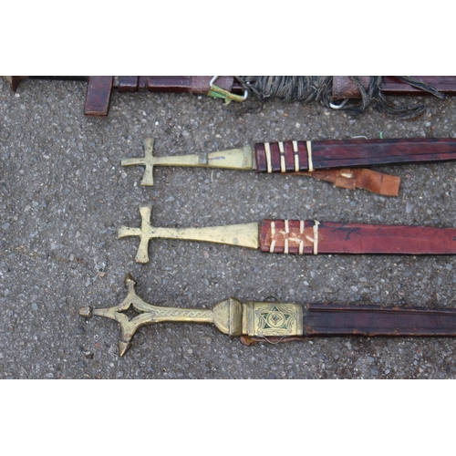 608 - FIVE ANTIQUE AND VINTAGE SWORDS, BELIEVED TO BE OF AFRICAN DESENT