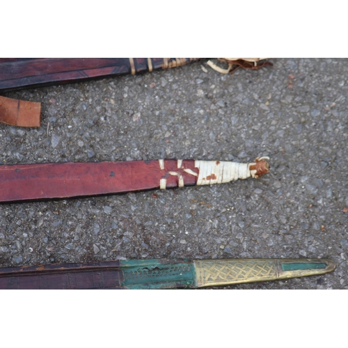 608 - FIVE ANTIQUE AND VINTAGE SWORDS, BELIEVED TO BE OF AFRICAN DESENT