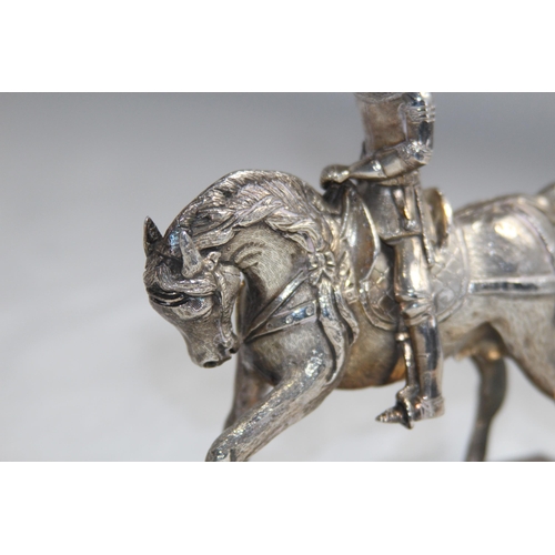 1095 - HEAVY WHITE METAL MODEL OF A KNIGHT ON HORSE BACK- 12 X 11CM