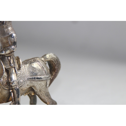 1095 - HEAVY WHITE METAL MODEL OF A KNIGHT ON HORSE BACK- 12 X 11CM