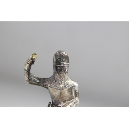 1095 - HEAVY WHITE METAL MODEL OF A KNIGHT ON HORSE BACK- 12 X 11CM