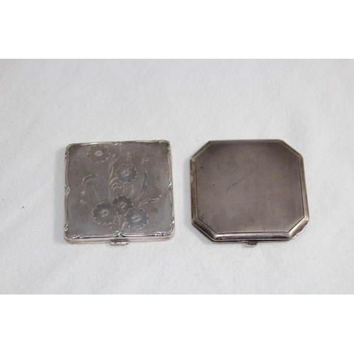 1099 - SILVER COMPACT OF OCTAGONAL FORM - BIRMINGHAM 1951 AND A FLORAL DECORATED WHITE METAL COMPACT