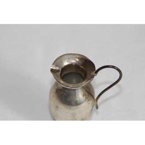 1104 - URN FORM SILVER CREAM JUG - 31G