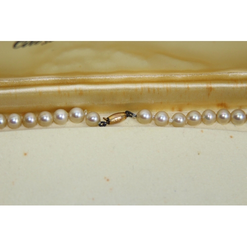 1182 - 2 X 9CT GOLD CLASPED GRADUATED FAUX PEARL NECKLACES, ONE CASED AND RETAILED BY CIRO OF BOND STREET