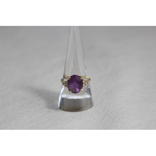 1196 - 9CT GOLD AMETHYST RING - 3.11G - SIZE P