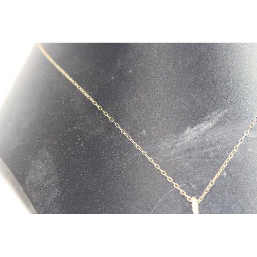 1202 - 9CT GOLD PENDANT NECKLACE - 2.54G