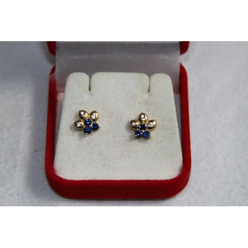 1214 - CASED PAIR OF 14CT GOLD SAPPHIRE AND DIAMOND STUD EARRINGS