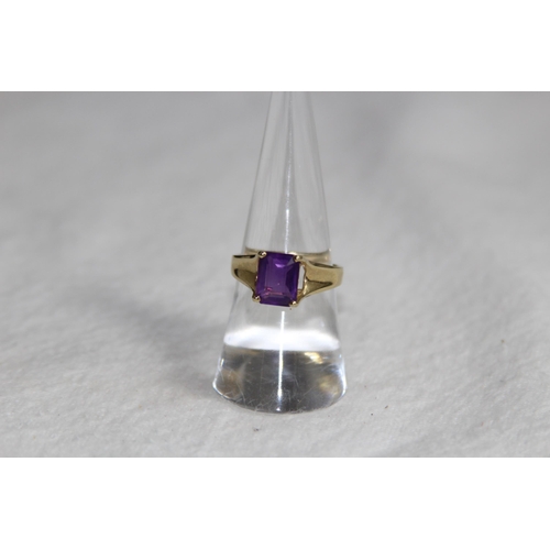 1215 - 9CT GOLD CUSHION CUT SOLITAIRE AMETHYST RING - 2.85G - SIZE O 1/2