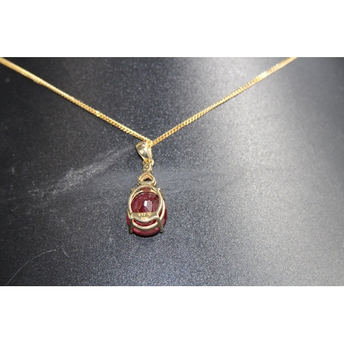 1220 - LARGE RUBY AND DIAMOND 9CT GOLD NECKLANE - 5.25G - BOXED