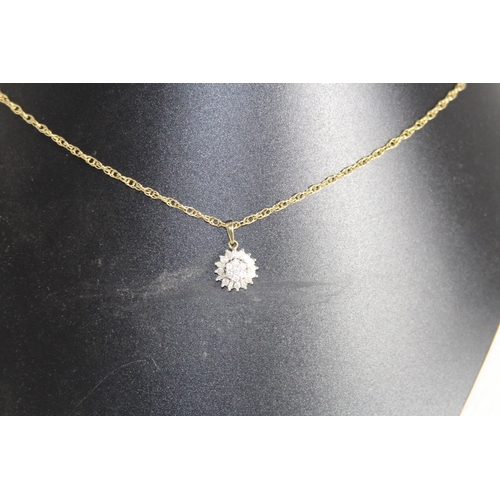 1221 - 9CT GOLD DIAMOND CLUSTER NECKLACE WITH A MIXTURE OF BRILLIANT AND BAGUETTE CUT DIAMONDS RETAILED BY ... 