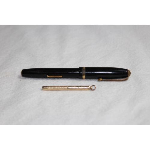 1224 - 14CT GOLD NIB CONWAY FOUNTAIN PEN AND A YELLOW METAL TWIST ACTION PENCIL MARKED R.M AND CO