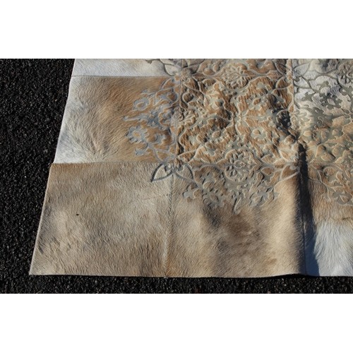 291 - EMBOSSED REAL HIDE RUG
147 X 119CM