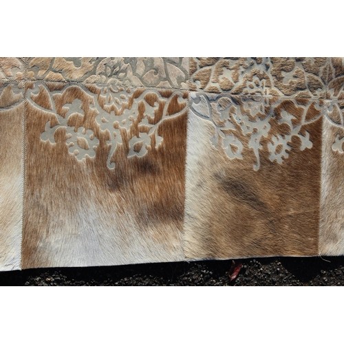 291 - EMBOSSED REAL HIDE RUG
147 X 119CM