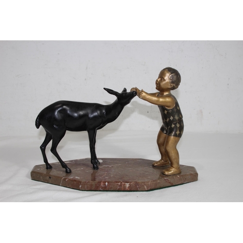 954 - COLD PAINTED FIGURE OF A YOUNG BOY AND DEER ON A MARBLE BASE
33 X 20CM