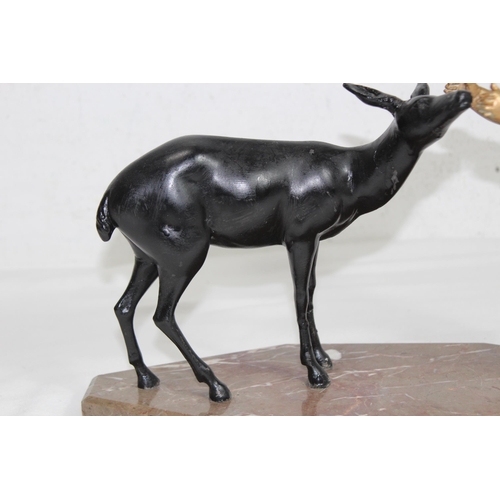 954 - COLD PAINTED FIGURE OF A YOUNG BOY AND DEER ON A MARBLE BASE
33 X 20CM