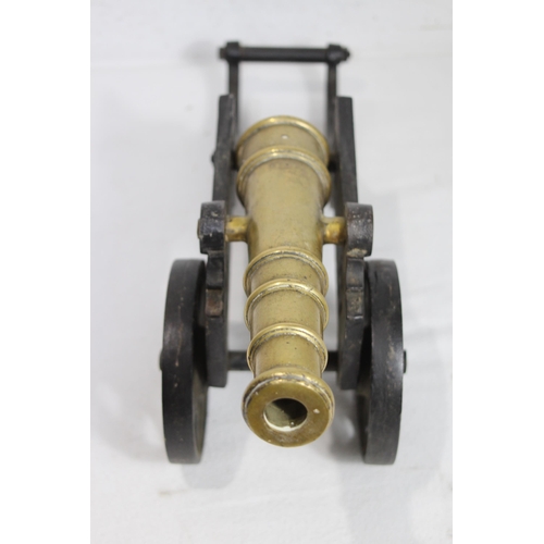 956 - VINTAGE BRASS MODEL CANNON
46 X 15 X 18CM