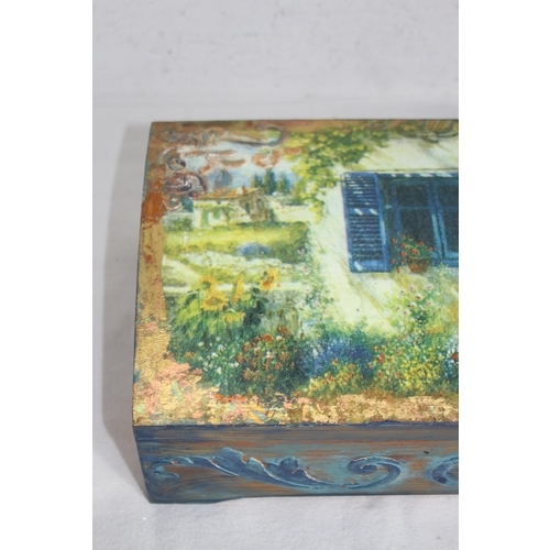 603 - PAINTED AND DECORATED KEEPSAKE WOODEN BOX
30 X 21 X 12CM