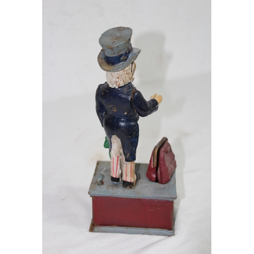 957 - NOVELTY CAST MONEY BOX
29 X 12 X 9CM