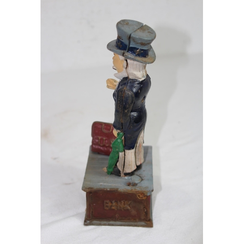 957 - NOVELTY CAST MONEY BOX
29 X 12 X 9CM