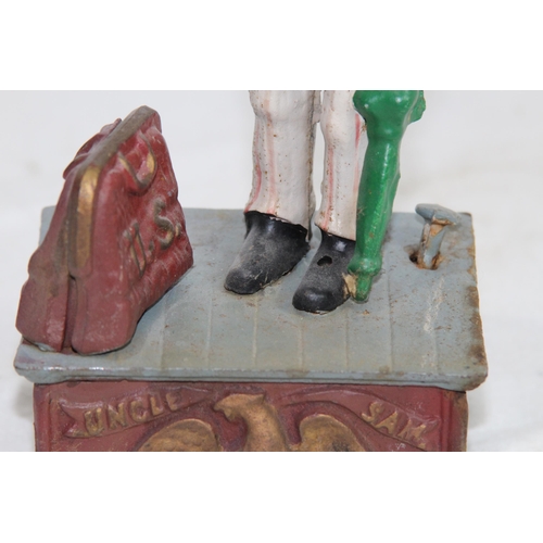 957 - NOVELTY CAST MONEY BOX
29 X 12 X 9CM