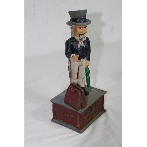 957 - NOVELTY CAST MONEY BOX
29 X 12 X 9CM