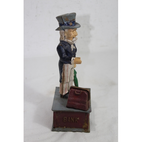 957 - NOVELTY CAST MONEY BOX
29 X 12 X 9CM