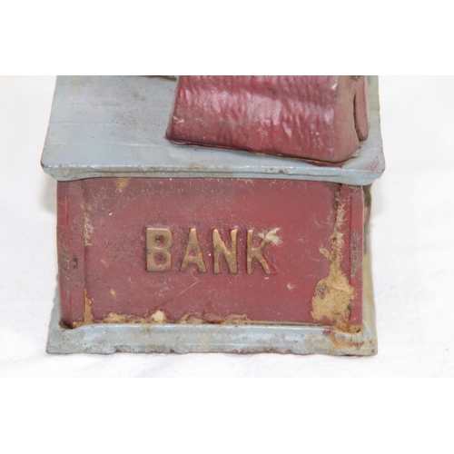 957 - NOVELTY CAST MONEY BOX
29 X 12 X 9CM