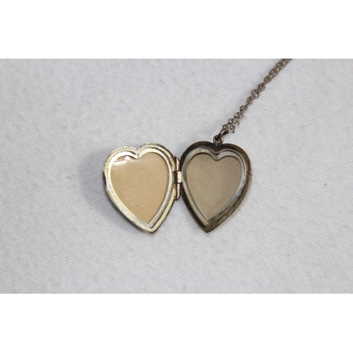 1013 - HEART SHAPE SILVER LOCKET ON A SILVER CHAIN AND ANOTHER SILVER LOCKET